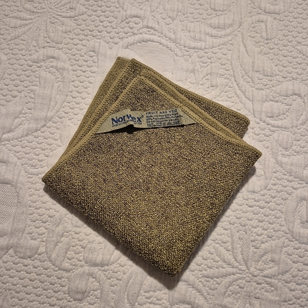 Norwex Veggie and Fruit Scrub Cloth. It is a dual-sided cloth olive green NWOT
